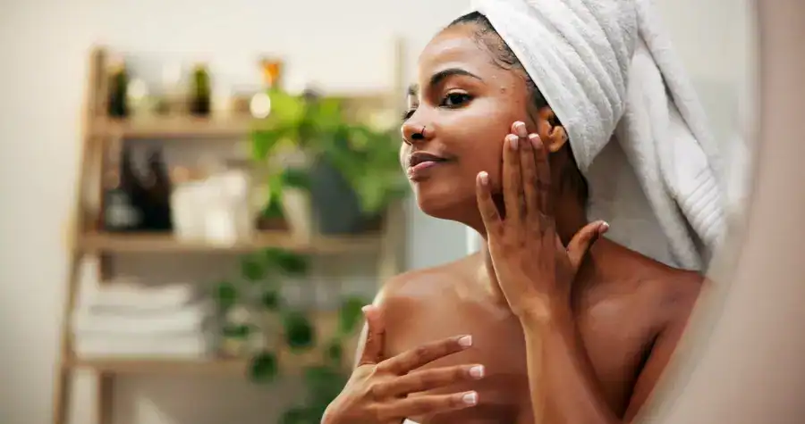 Woman performing her skincare routine